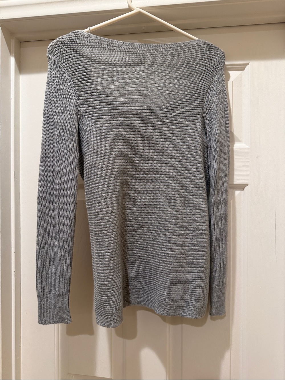 Reversible twist back/front sweater.